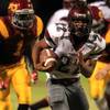 Photo: Cimarron Memorial running back Justin Davis breaks Photo: Cimarron Memorial running back Justin Davis breaks